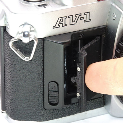 Battery compartment cover replacement for Canon AV-1