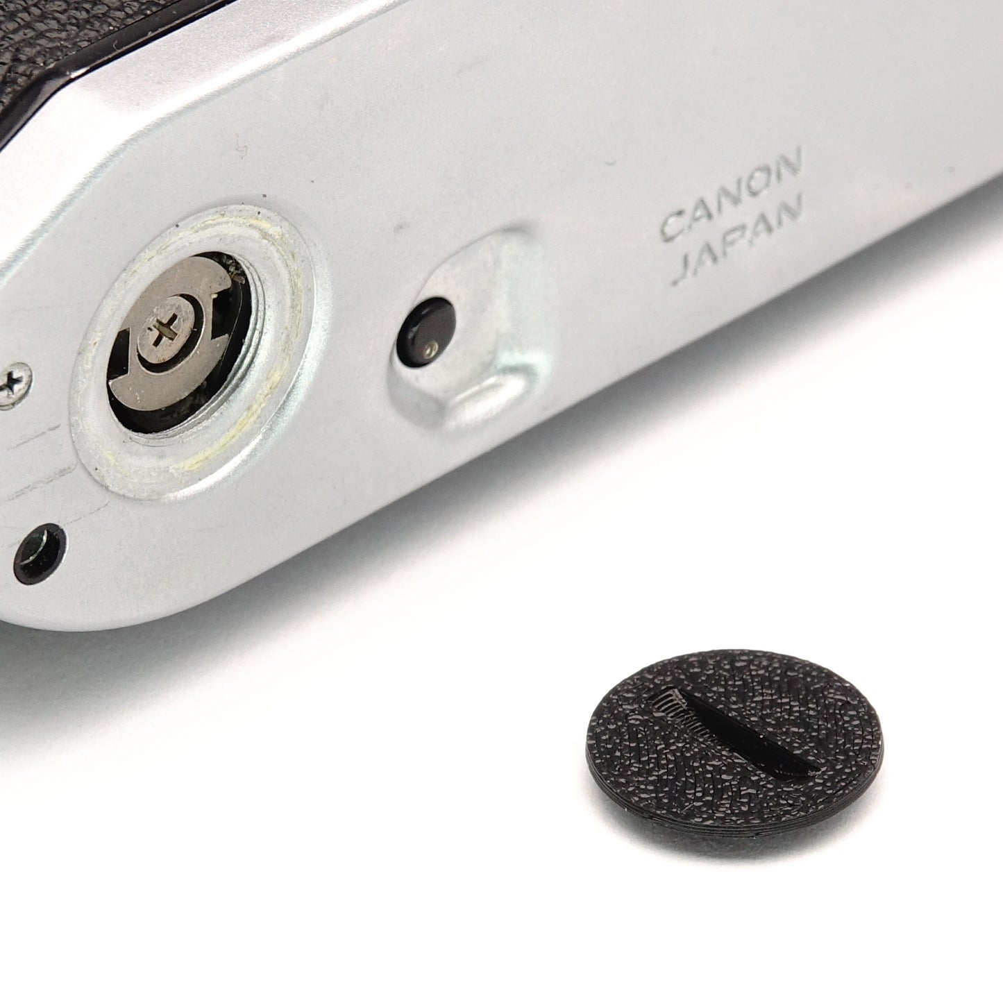 Coperchio di protezione per attacco winder per Canon AE-1, A-1 e Program